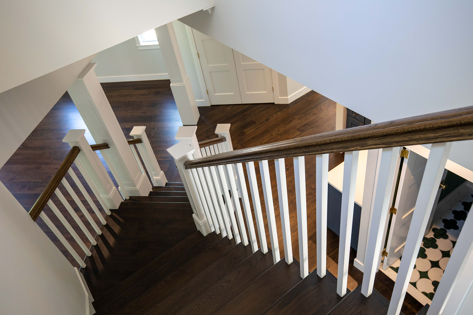 Dark Wood Staircase with White Posts
